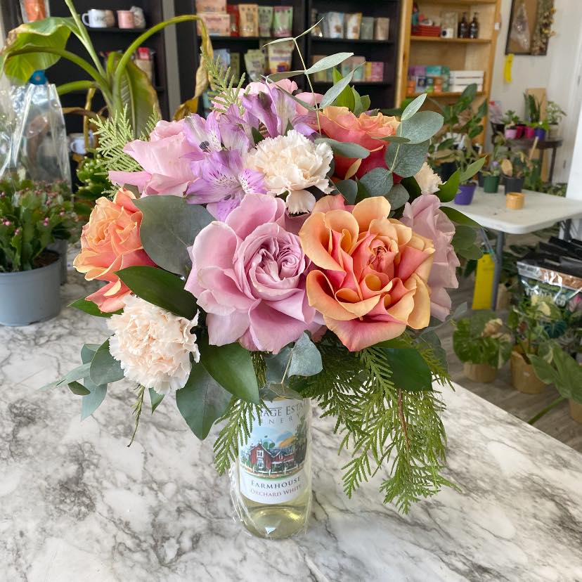 Wine Bottle paired with flowers