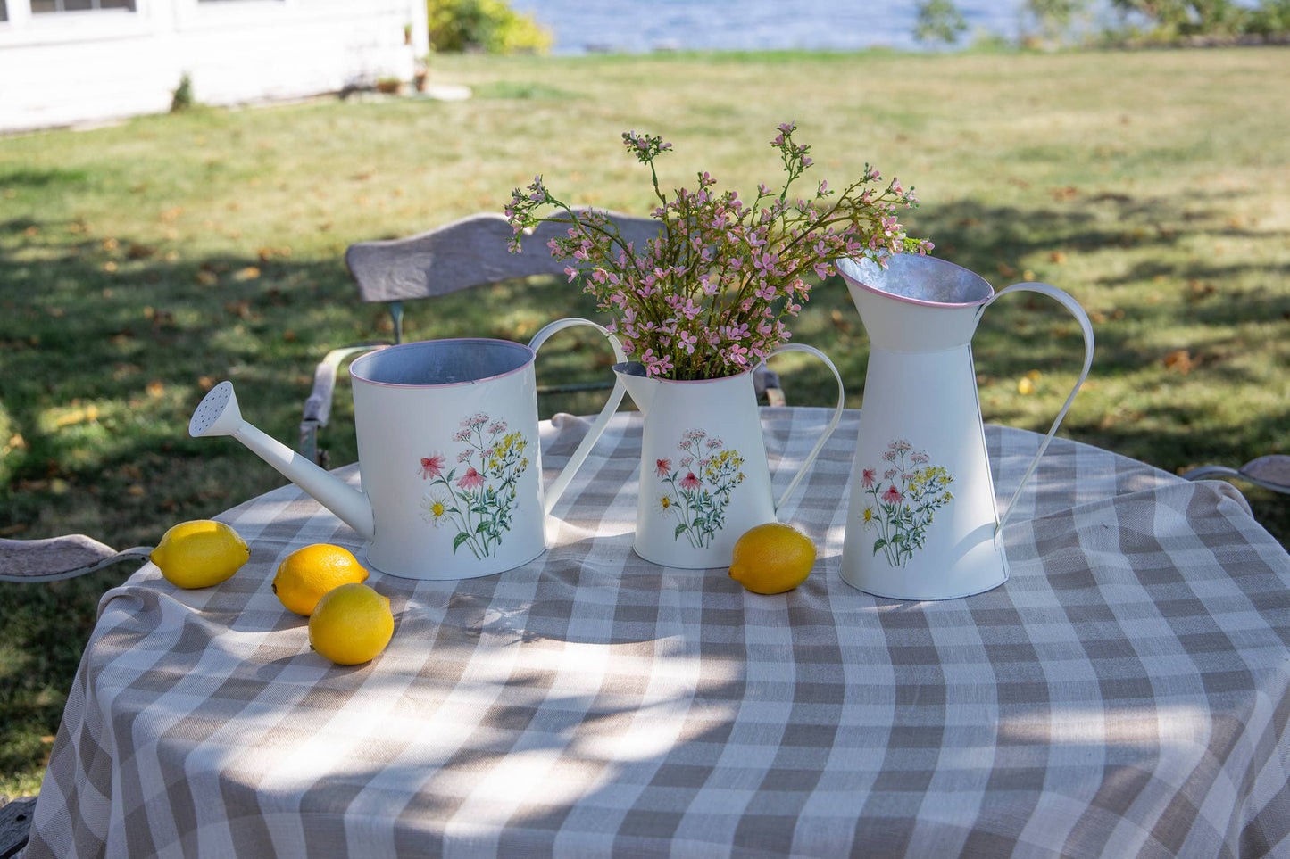 METAL PITCHER WITH FLORAL EMBOSS DESIGN